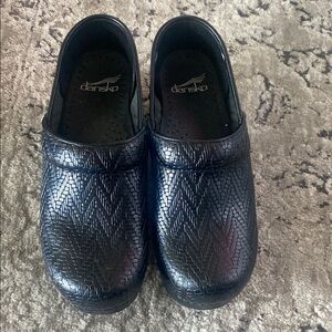 Dansko Black Embossed Clogs